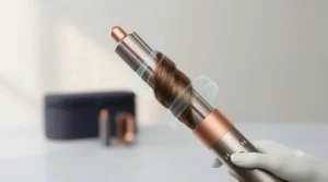 Diagrammatic representation highlighting the advanced Coanda airflow technology of an all-in-one hair styling tool wrapping hair smoothly around the barrel.