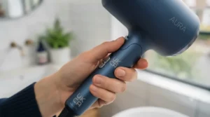 Close-up of the non-slip, contoured handle on the ergonomic hair dryer for a secure and comfortable grip.