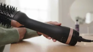 Showing the lightweight, ergonomic handle design of the Revlon hot air brush.