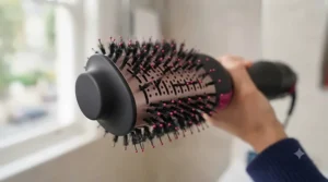 Ceramic-coated barrel and airflow vents of the Revlon One Step hot air styler for even heat distribution.