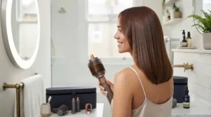 Glossy, frizz-free straight results achieved on thick hair using the smoothing paddle attachment of an all-in-one hair styling tool.