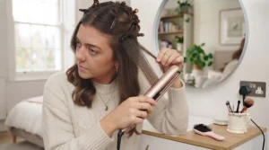 Sectioned hair clipped up neatly with hair sectioning clips in a salon setting