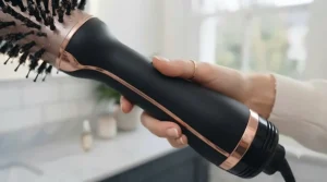 Ergonomic, lightweight handle of a 2 in 1 hair dryer brush designed for comfortable grip during daily use.