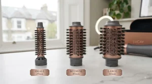 Infographic comparing small, medium, and large barrel sizes on a hot air styling brush for short and long hair.
