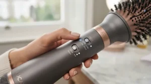 Graphic highlighting cool shot, low, and high heat settings on an ionic hot air styling brush.