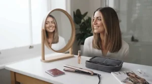 Sleek, frizz-free hair styling achieved using a mini travel straightener for a quick touch-up after a flight.